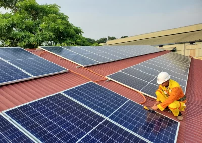 Ace-Projects-electrician-installing-solar-panels-on-rooftop-in-East-London