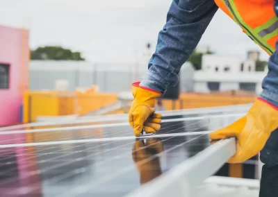 Ace-Projects-electrician-securing-solar-panel-on-rooftop-in-East-London